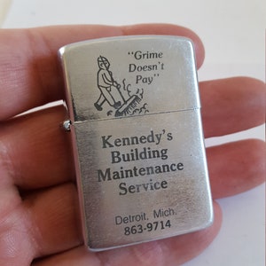 Vintage circa 1970&#39;s advertising cigarette lighter Kennedy&#39;s Building Maintenance Service Detroit, Michigan &quot;Grime Doesnt Pay&quot;