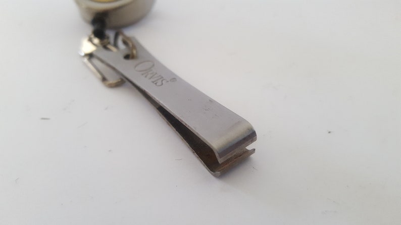 Japanese stainless steel brass badge Vintage Circa 1980/'s Orvis flyfishing nippers on retractable pin