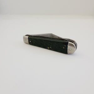 Vintage Camco Stockman 2 blade pocket knife with black Delrin scales, drop point, pen blades cleaned, edged