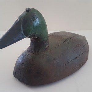 Vintage/Antique hand carved/painted duck hunting decoy. Was used and is possibly signed or at least identified &quot;McBride&quot;, mallard