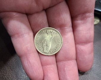 Vintage novelty coin, Heads I win, Tails you lose, polished brass, topless woman on heads side, bottomless on tails.