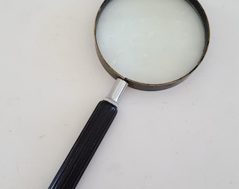 Vintage 1960's Atco USA Catalin handle magnifying glass, 3" glass, black painted brass frame unknown power.