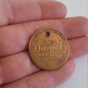 Vintage circa 1960&#39;s rare keyring medallion Daniel&#39;s &quot;Arizona&#39;s Busiest Jeweler&quot; brass