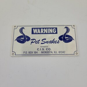 Vintage adhesive back sign &quot;Warning Pet Snakes&quot; Member of C.I.S. Co. Mendota, ILL measures 4&quot; x 2&quot;
