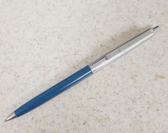 Vintage circa 1960&#39;s Paper Mate &quot;slim&quot; Profile ballpoint pen has ink, nice condition baby blue and chrome, double hearts worn. old cartridge