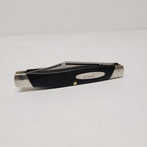 Vintage circa 1970's Buck Knife Rancher No. 319 medium pocket knife with nickel bolsters and spiral awl pre-date codes