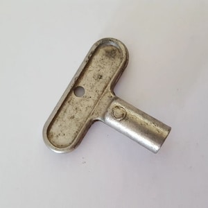 Vintage 1960&#39;s gas shut/off turn/on key with 1/4&quot; square chuck.