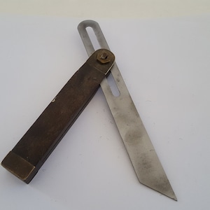 Antique sliding T-bevel rosewood with brass fittings possibly replacement blade probably made by Stanley in early 1900's