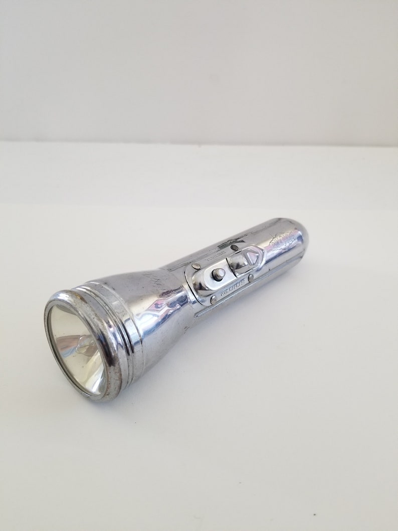 Lampe de poche Ray-O-Vac « bullet » vintage vers 1930, lentille en verre en état de fonctionnement, piles (cellules 3 D) non incluses Logo Cloud - France