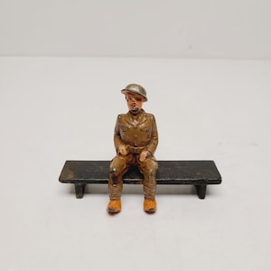 Vintage Manoil Barclay Metal Toy Figures: seated soldier no rifle, scarce figure