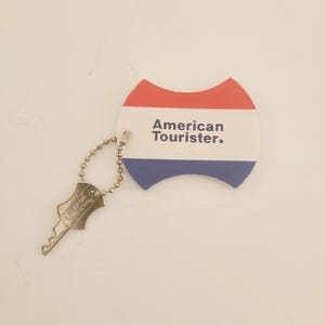 Vintage luggage tag, American Tourister with matching key, vintage travel luggage good condition with bubble chain