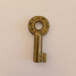 Antique early 20th Century C.R.I. & P RR Chicago Rock Island Pacific Railroad brass signal box key No.37652 S, Adams and Westlake