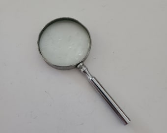 Vintage 60's Japanese magnifying glass, thin brass frame, handle with chrome plating, clean glass. 1 5/8" diameter. 3 3/4" long, nice glass