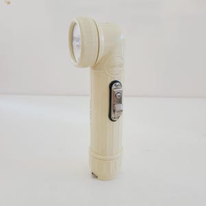 Vintage Bright Star MX-99 Flashlight: White Plastic, Floxite Advertising