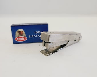 Vintage circa 1970's-1980's unmarked "Tot 50" style mini stapler with partial box of staples, nice working condition, rare colors