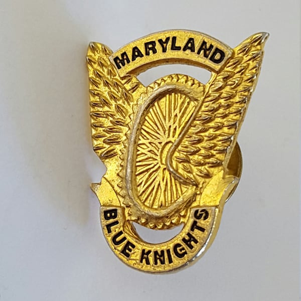 Vintage Law Enforcement Motorcycle Club pin, Maryland Blue Knights, winged tire, clutch back.