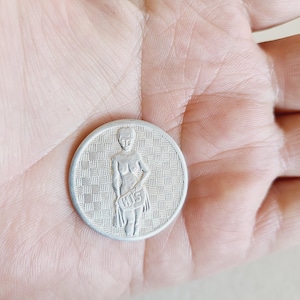 Vintage novelty risqué coin, aluminum &quot;His&quot; &quot;Hers&quot; filpping coin. 1970&#39;s, measures 1 3/16&quot; diameter