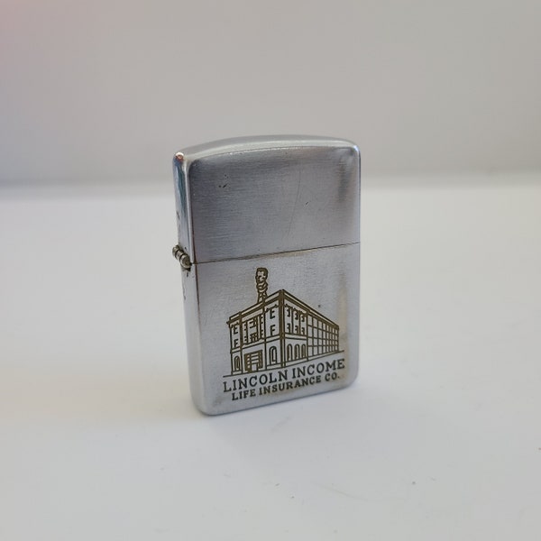 Vintage 1958 Zippo 8 dot date code (Pat 2517191 Pat. Pending)cigarette lighter, used, has spark needs fluid Lincoln Income Life insurance Co