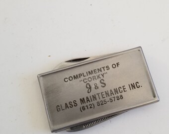 Vintage 1970&#39;s advertising money clip/folding knife and nail file, stainless steel Made in Hong Kong J&S Glass Maintenance Inc, Minnesota