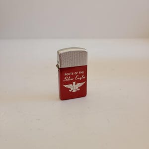Vintage circa 1960&#39;s to 1970&#39;s old stock advertising cigarette lighter by Park Avenue for The Route of The Silver Eagles, Trailways Buslines