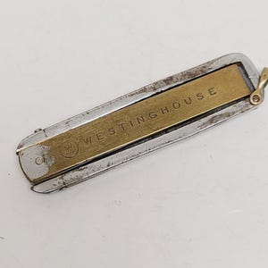 Vintage Funny Folder Knife: Westinghouse with 2" 32nds and 64ths ruler Yankee