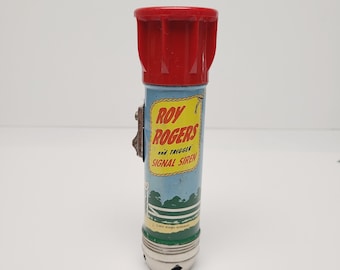 Linterna UsaLite Roy Roger's and Trigger RR22 vintage de 1954 con sirena. Fabricada en EE. UU. con excelentes gráficos. Funciona.