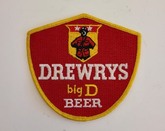 Vintage 1950's to 1960's old stock embroidered uniform patch Drewry's big D Beer, never sewn condition