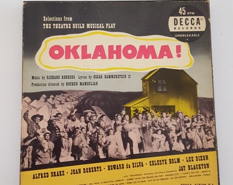 Vintage circa 1950 box set of 45 rpm records of the Original Theatre Guild cast of Oklahoma! Decca records good