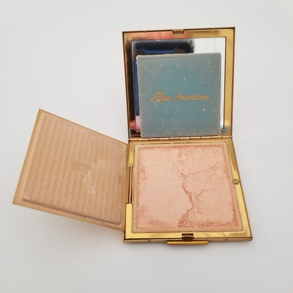 Vintage 1940's-1963 Elgin American brass compact mirror and powder space, new unused condition with etched petals