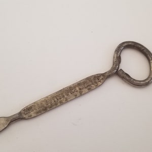 Vintage possibly antique bottle opener and milk/cream cap lifter Aurora Butter & Ice Cream Co. Pure Pasteurized Cream Milk