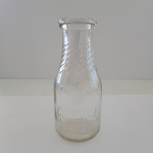 Vintage circa 1930&#39;s molded glass milk bottle, Coleman Dairy, Pueblo, Colorado pint size
