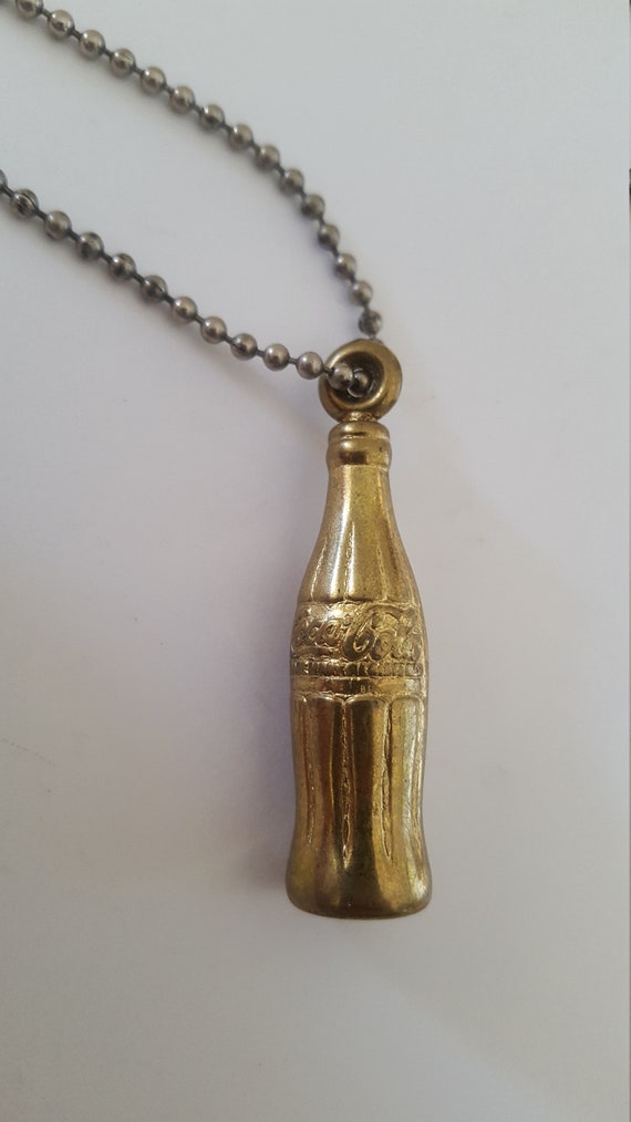 Vintage 1950's brass Coke bottle keychain on bead… - image 1