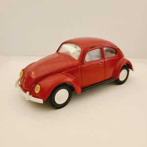 Vintage nice condition Tonka Volkswagen 52680, complete in red with some scratches on hood and right door. shelf sitter toy car Made in USA