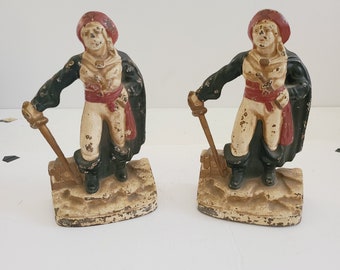 Vintage circa 1920's cast iron bookends pair with a Pirate standing on a treasure chest, chippy paint but mostly there, unknown maker