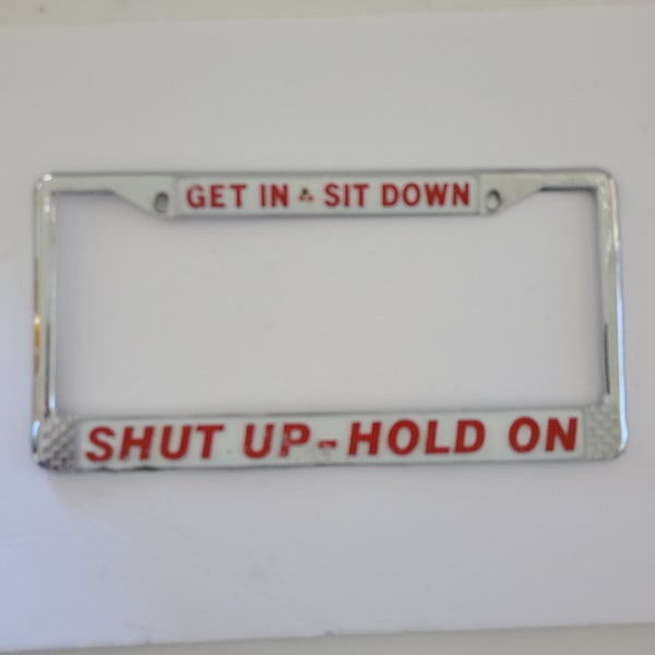 Vintage 1970's license plate frame "Get In-Sit Down Shut Up Hold On", used condition standard size frame