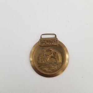 Vintage 1960&#39;s Bucyrus Erie Earth Moving Equipment watch fob, heavy equipment, mining, earth scrapers, Binder Machinery Co Union NJ