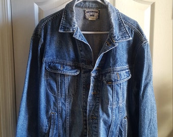 Vintage circa 1990's Authentic Lee Jean jacket distressed denim size large in great condition wear at collar.