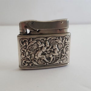 Vintage 1952 MYFLAM Duplex pocket cigarette lighter with silver casing