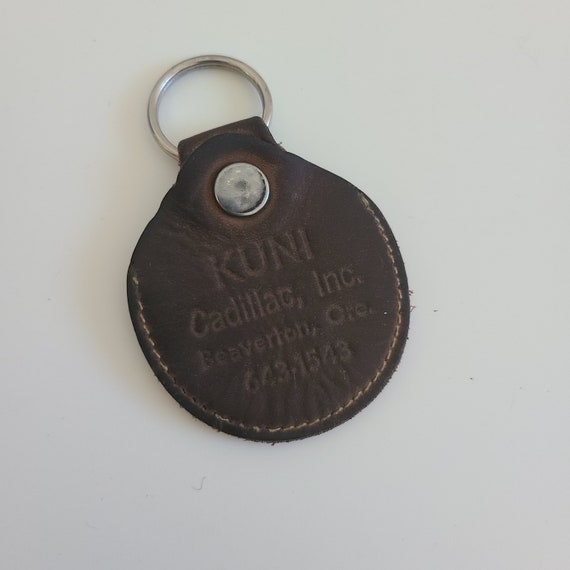 Vintage circa 1980s used advertising leather fob … - image 4