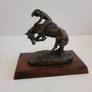 Vintage Remington &quot;The Rattlesnake&quot; Bronze Sculpture on Exotic Wood Base