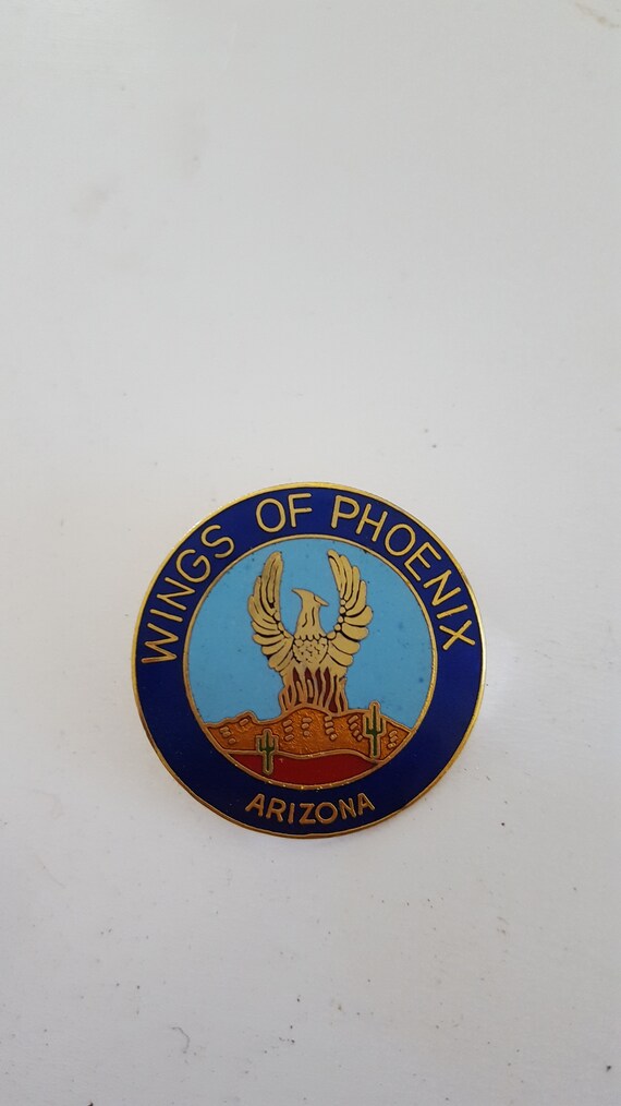 Vintage circa 1980's enamel pin "Wings of Phoenix 