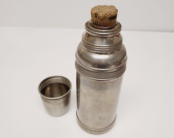 Antique American Thermos Brand vacuum bottle model 6 1/2, all original with minor scratches from use.