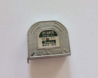 Vintage circa 1960's "Atlantic" brand 10 ft tape measure white tape in nice condition USA made Union NJ