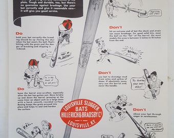 A George 'Babe' Ruth vintage souvenir mini Louisville Slugger baseball A George 'Babe' Ruth vintage souvenir mini Louisville Slugger baseball