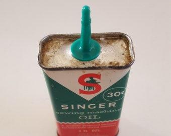 VINTAGE SINGER SEWING MACHINE OIL 4 OZ TIN WITH 75 CENT PRICE SOME