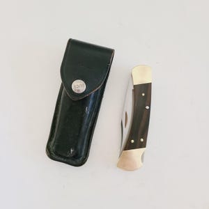 BUCK 110 - MADE IN USA POCKET FOLDING KNIFE + LEATHER SHEATH