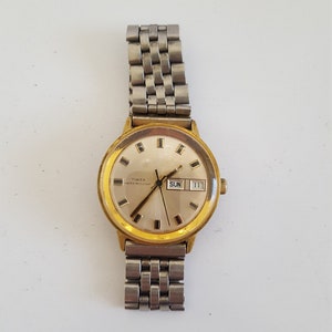 Vintage Timex Marlin mechanical day/date wristwatch 26860 2770 ('70)no numerals good condition Dust/Water Resistant not working consistently