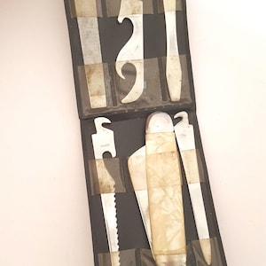 Vintage circa 1960&#39;s wallet style attachments style tool kit, 6 blades made in Japan, advertising Haines City Florida