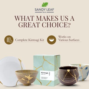 May include: A complete Kintsugi repair kit with a light blue box and various repaired ceramic pieces. The kit includes everything needed to mend broken pottery with gold-colored accents. The text on the box reads "Kintsugi Repair Kit."