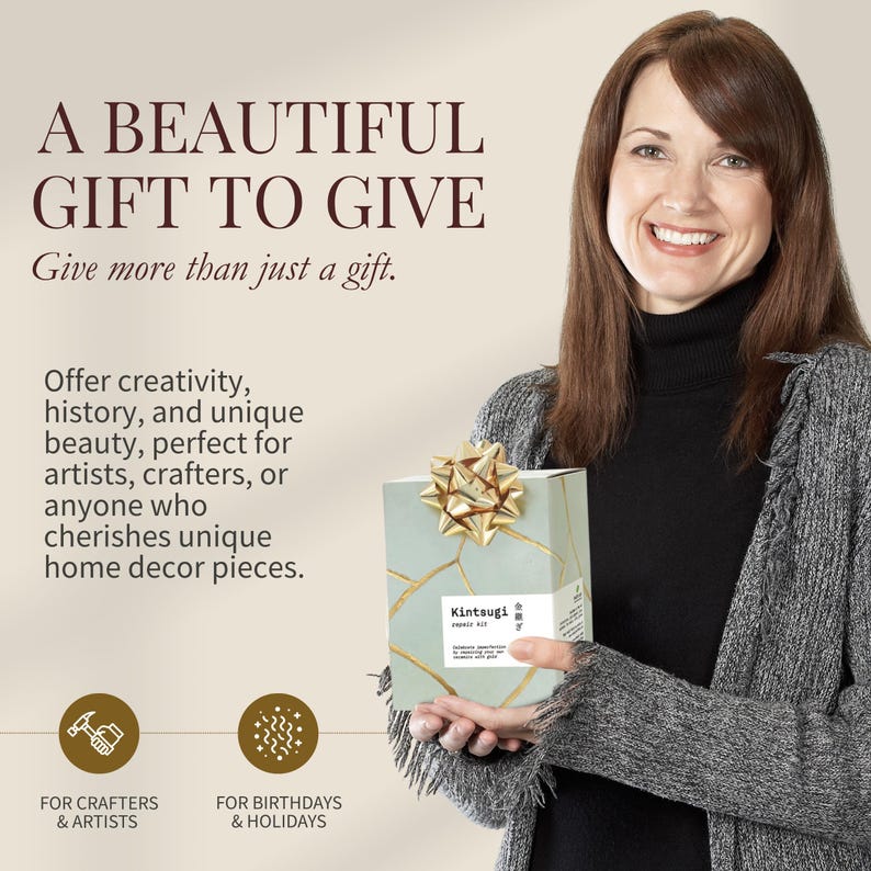 May include: A woman holds a gift box with a gold bow. The box is light blue with gold crackle lines and the word "Kintsugi" on the front. Text on the image reads "A beautiful gift to give" and "For crafters & artists" and "For birthdays & holidays."